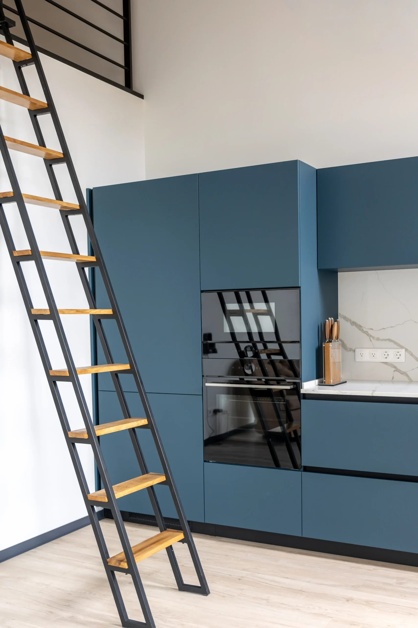 blue kitchen with metal ladder built oven loft kitchen scaled